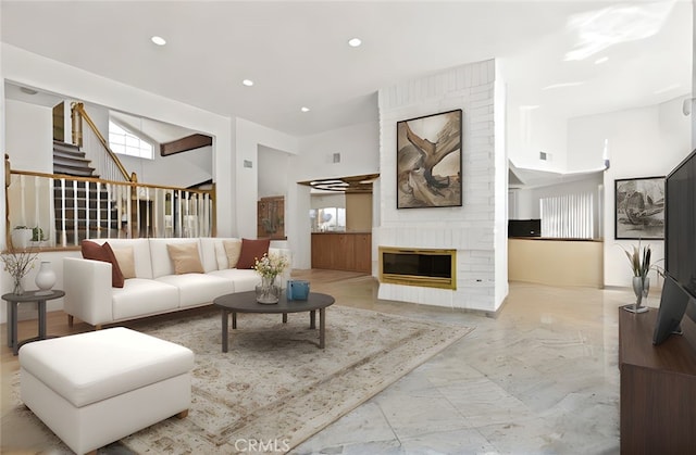 4205 Hermitage Dr, Hacienda Heights, CA 91745 - living room featuring marble finish flooring, stairway, recessed lighting, and a fireplace
