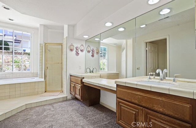 4205 Hermitage Dr, Hacienda Heights, CA 91745 - full bathroom with a shower stall, recessed lighting, vanity, and a bath