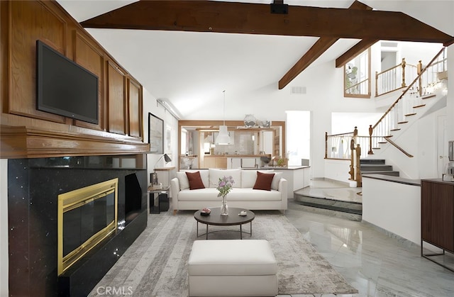 4205 Hermitage Dr, Hacienda Heights, CA 91745 - living area with stairs, a fireplace, light marble finish flooring, and beamed ceiling