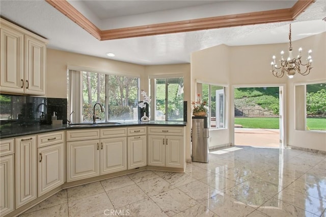4205 Hermitage Dr, Hacienda Heights, CA 91745 - kitchen featuring cream cabinets and plenty of natural light