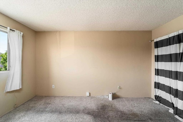 4643 Cherokee Ave, San Diego, CA 92116 - unfurnished room with carpet flooring and a textured ceiling