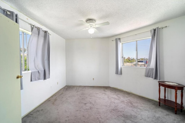 4643 Cherokee Ave, San Diego, CA 92116 - carpeted empty room featuring a ceiling fan and a textured ceiling