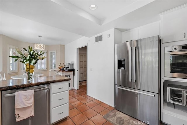 12045 Falcon Crest Way, Porter Ranch, CA 91326 - kitchen featuring appliances with stainless steel finishes, white cabinets, light tile patterned floors, a chandelier, and recessed lighting