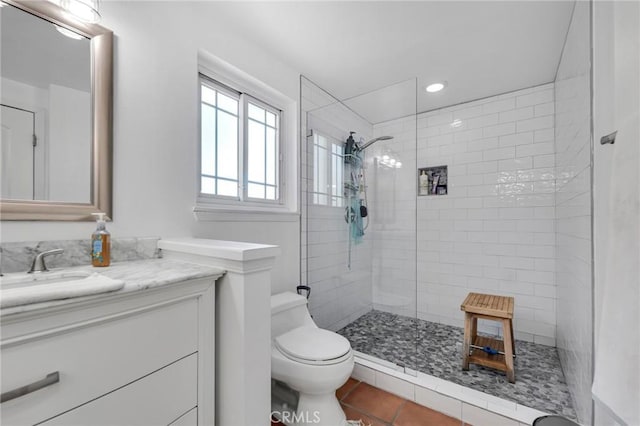 12045 Falcon Crest Way, Porter Ranch, CA 91326 - full bath with a walk in shower, tile patterned flooring, vanity, toilet, and recessed lighting