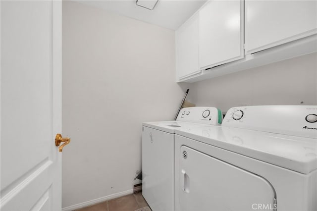 12045 Falcon Crest Way, Porter Ranch, CA 91326 - washroom featuring cabinet space, washer and dryer, light tile patterned floors, and baseboards