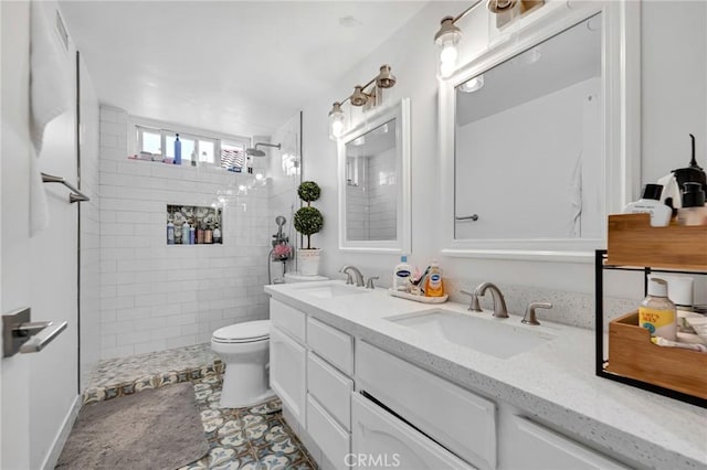 12045 Falcon Crest Way, Porter Ranch, CA 91326 - bathroom featuring double vanity, walk in shower, toilet, and tile patterned flooring