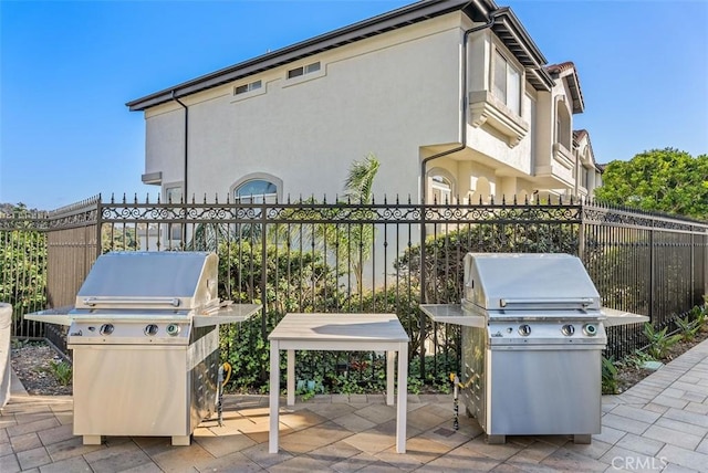 30902 Clubhouse Dr Unit 28C, Laguna Niguel, CA 92677 - view of patio / terrace featuring grilling area