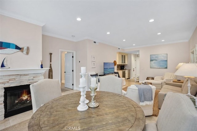30902 Clubhouse Dr Unit 28C, Laguna Niguel, CA 92677 - dining room featuring recessed lighting, a stone fireplace, and crown molding