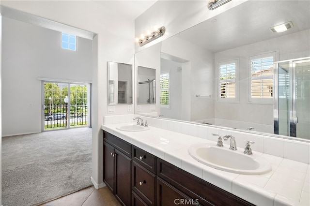 61 Silverado, Irvine, CA 92618 - full bath with double vanity, a garden tub, and a shower stall