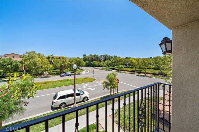 61 Silverado, Irvine, CA 92618 - balcony featuring view of wooded area