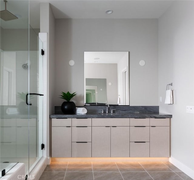 18510 Boulder Blf, Silverado, CA 92676 - bathroom with a stall shower, vanity, tile patterned flooring, and baseboards