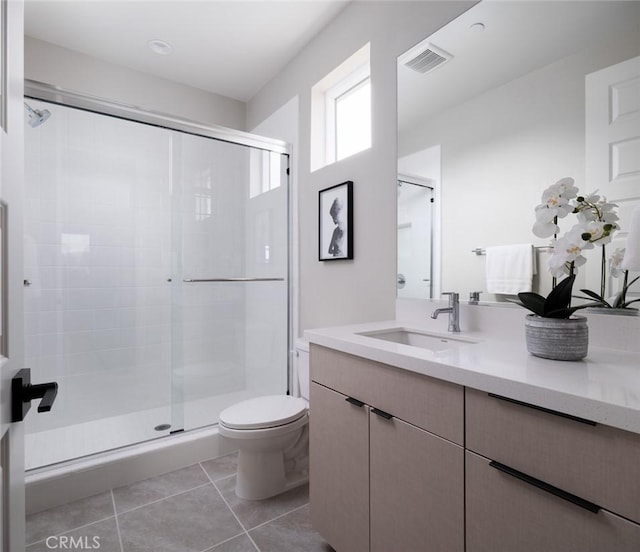 18510 Boulder Blf, Silverado, CA 92676 - full bathroom with vanity, a shower stall, toilet, and tile patterned flooring
