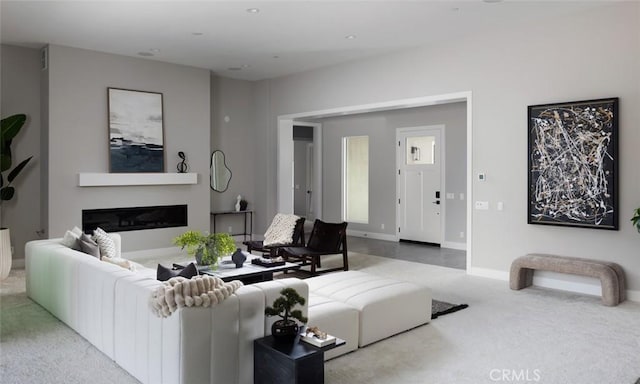 18510 Boulder Blf, Silverado, CA 92676 - living room featuring carpet flooring, baseboards, and a glass covered fireplace