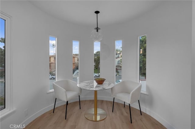 3649 Mount Vernon Dr, View Park, CA 90008 - dining room featuring healthy amount of natural light and wood finished floors