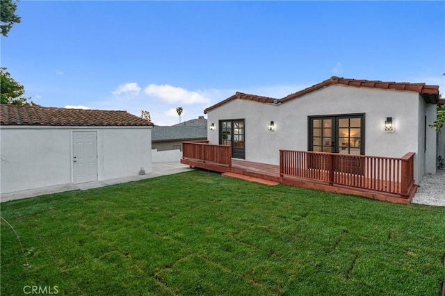 3649 Mount Vernon Dr, View Park, CA 90008 - rear view of house featuring french doors, a deck, a yard, stucco siding, and a tiled roof