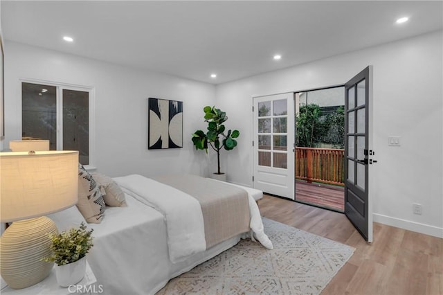 3649 Mount Vernon Dr, View Park, CA 90008 - bedroom with light wood-style floors, access to outside, recessed lighting, and french doors
