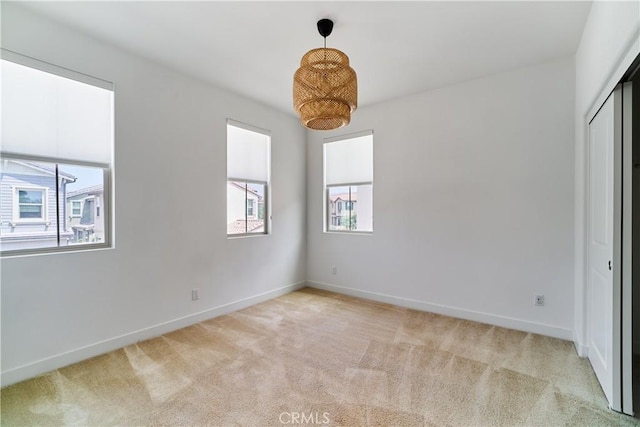 12392 Sandy Ct, Whittier, CA 90602 - unfurnished room with light colored carpet and baseboards