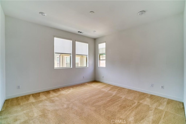 12392 Sandy Ct, Whittier, CA 90602 - unfurnished room featuring light carpet and baseboards
