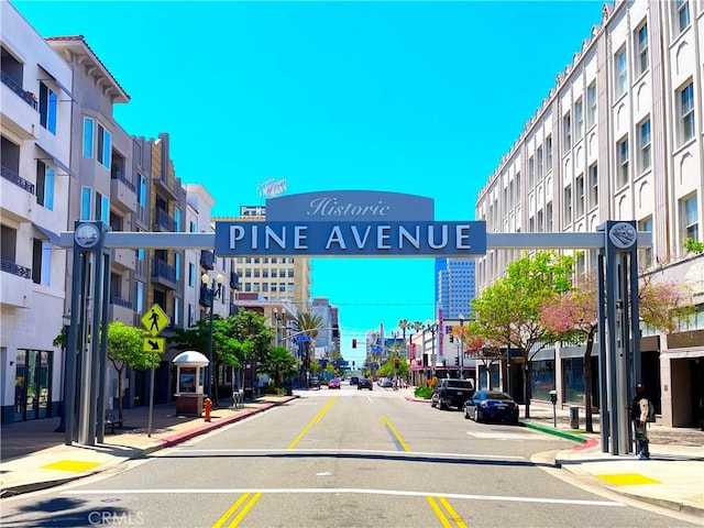 645 Chestnut Ave Unit 202, Long Beach, CA 90802 - view of asphalt street with curbs, sidewalks, street lights, and traffic lights