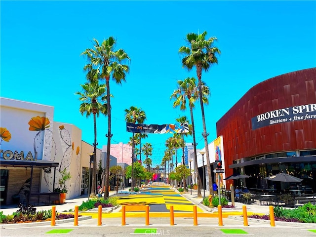 645 Chestnut Ave Unit 202, Long Beach, CA 90802 - view of asphalt street featuring street lights, sidewalks, and curbs