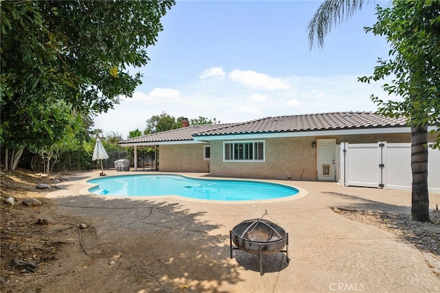 732 Hilary Ln, Redlands, CA 92373 - view of swimming pool with a fire pit, a patio, and a gate
