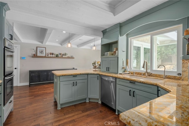 732 Hilary Ln, Redlands, CA 92373 - kitchen featuring stainless steel appliances, a sink, a peninsula, dark wood finished floors, and light stone countertops
