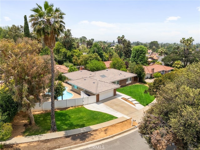 732 Hilary Ln, Redlands, CA 92373 - drone / aerial view of a pool area and a tree filled landscape