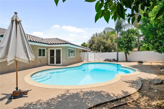 732 Hilary Ln, Redlands, CA 92373 - view of swimming pool featuring french doors, a fenced backyard, and a patio area