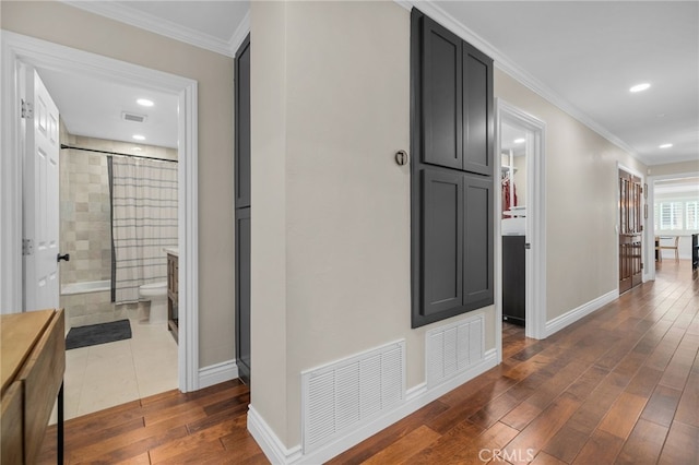 732 Hilary Ln, Redlands, CA 92373 - hallway with dark wood-style flooring, baseboards, recessed lighting, and crown molding