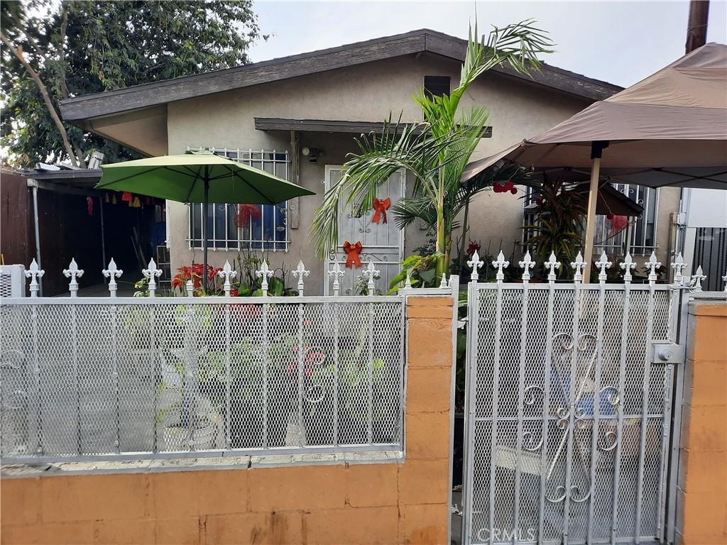 5727 Bandera St, Los Angeles, CA 90058 - view of front of house featuring stucco siding