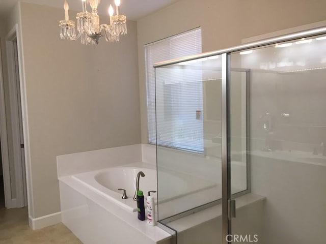 639 Burnt Ranch Way, Chico, CA 95973 - bathroom with a shower stall, a garden tub, and a chandelier