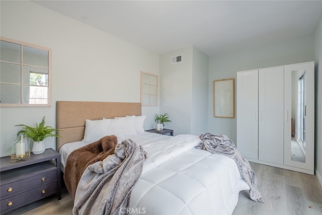 244 N Hollywood Way, Burbank, CA 91505 - bedroom with light wood-style flooring and a closet