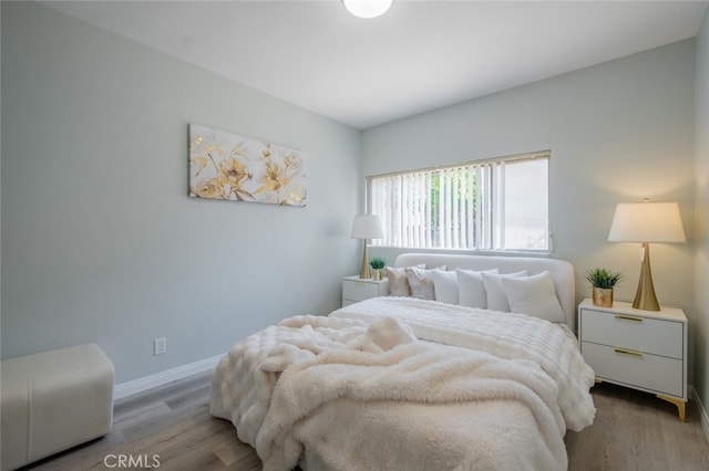 244 N Hollywood Way, Burbank, CA 91505 - bedroom with wood finished floors and baseboards