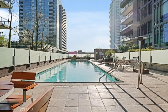 1111 S Grand Ave Unit 702, Los Angeles, CA 90015 - community pool with a patio area