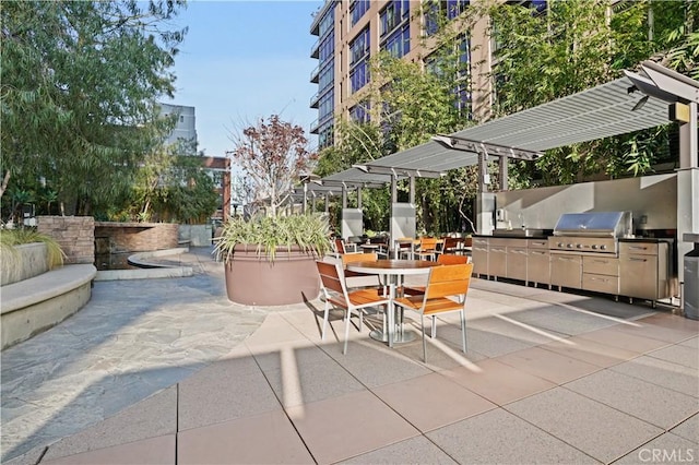 1111 S Grand Ave Unit 702, Los Angeles, CA 90015 - view of patio featuring outdoor dining area