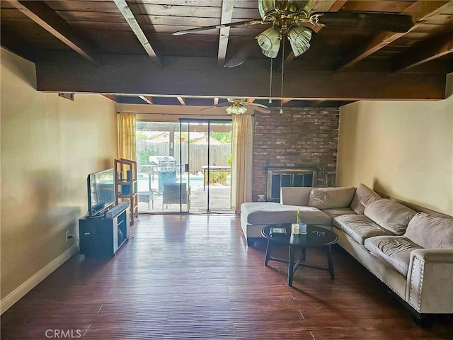 7121 Lion St, Rancho Cucamonga, CA 91701 - living room featuring a ceiling fan, wood finished floors, wood ceiling with exposed beams, baseboards, and a brick fireplace