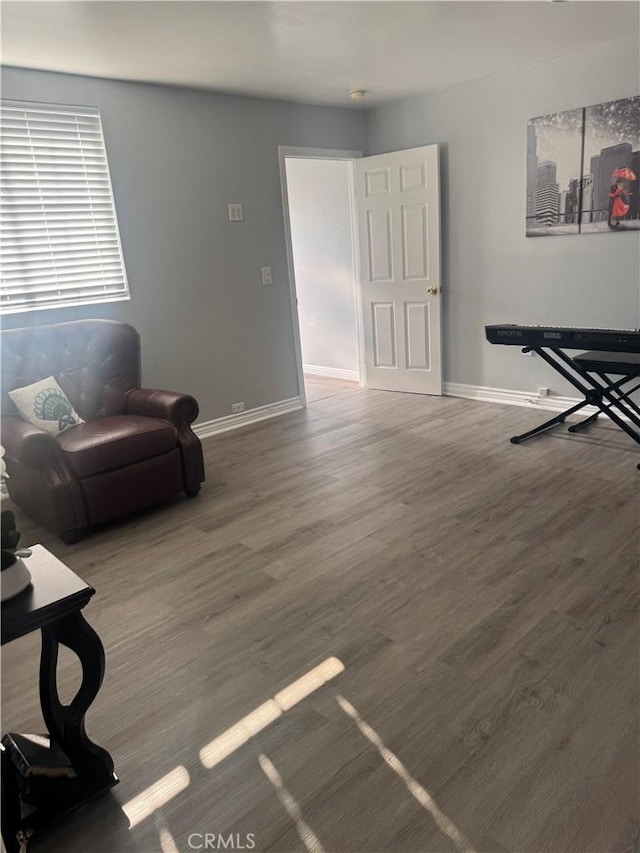 13538 Lukay St, Whittier, CA 90605 - living area with baseboards and wood finished floors