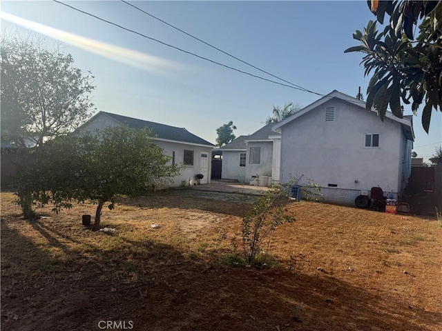 13538 Lukay St, Whittier, CA 90605 - back of property featuring crawl space and stucco siding