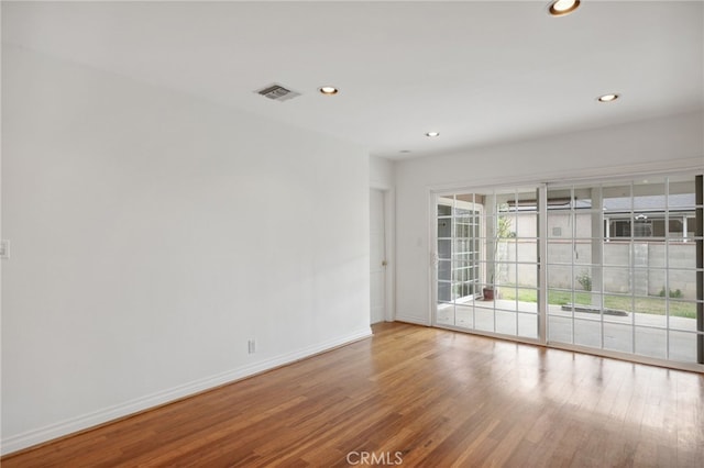 6515 Amigo Ave, Reseda, CA 91335 - spare room with recessed lighting, baseboards, and wood finished floors
