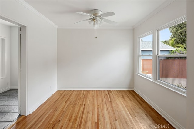 6515 Amigo Ave, Reseda, CA 91335 - spare room with plenty of natural light, light wood-type flooring, ceiling fan, baseboards, and crown molding