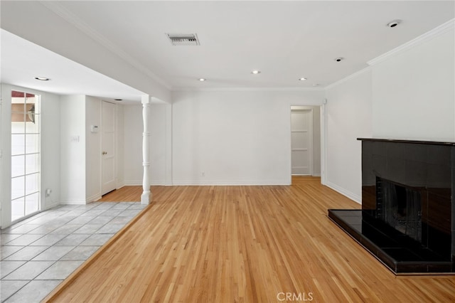 6515 Amigo Ave, Reseda, CA 91335 - unfurnished living room with a tiled fireplace, light wood finished floors, crown molding, baseboards, and recessed lighting