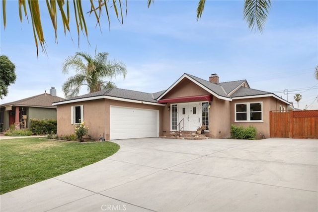 6515 Amigo Ave, Reseda, CA 91335 - single story home featuring stucco siding, concrete driveway, a garage, and a chimney