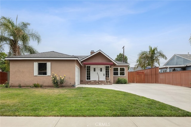 6515 Amigo Ave, Reseda, CA 91335 - ranch-style house featuring stucco siding, concrete driveway, and a chimney