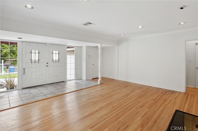 6515 Amigo Ave, Reseda, CA 91335 - foyer with crown molding, light wood-style flooring, baseboards, and recessed lighting