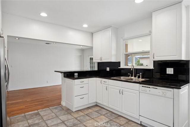 6515 Amigo Ave, Reseda, CA 91335 - kitchen with dishwasher, backsplash, dark countertops, a sink, and recessed lighting