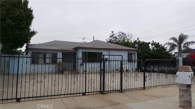 13912 Daventry St, Pacoima, CA 91331 - view of front of home featuring a fenced front yard and stucco siding