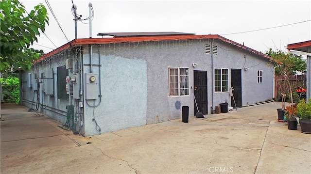 13912 Daventry St, Pacoima, CA 91331 - view of home's exterior with stucco siding and a patio
