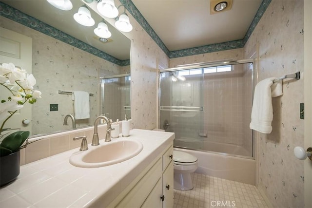 233 Elaine Way, Pismo Beach, CA 93449 - bathroom with toilet, vanity, enclosed tub / shower combo, and wallpapered walls