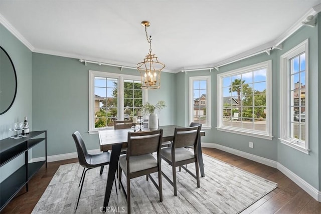 233 Elaine Way, Pismo Beach, CA 93449 - dining room featuring ornamental molding, baseboards, a chandelier, and wood finished floors