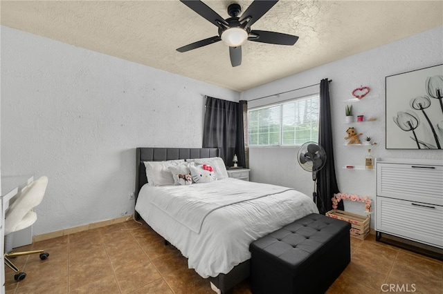 510 Archibald Ct, Colton, CA 92324 - tiled bedroom featuring a textured ceiling, a textured wall, and ceiling fan
